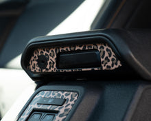 Load image into Gallery viewer, Bronco Leopard Center Console Latch Insert 2021–2025 | Leopard Print Vinyl Wrap Overlay | Interior Trim Decal Cover - Ford Bronco