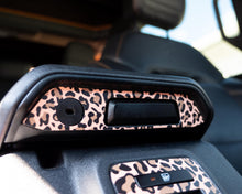 Load image into Gallery viewer, Bronco Leopard Center Console Latch Insert 2021–2025 | Leopard Print Vinyl Wrap Overlay | Interior Trim Decal Cover - Ford Bronco